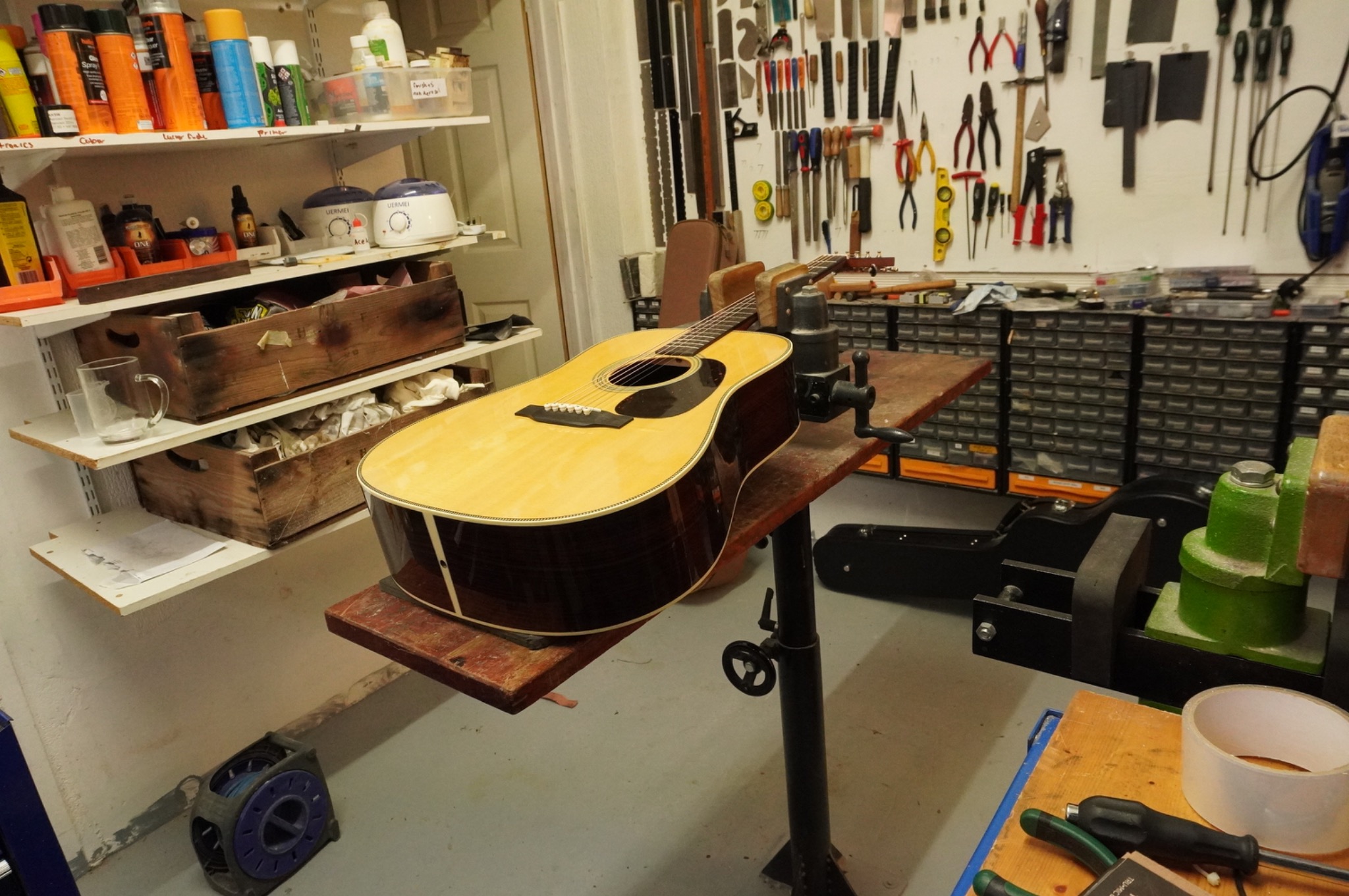 Martin acoustic guitar on the Guitar Doctor UK workshop support during LR Baggs Anthem installation